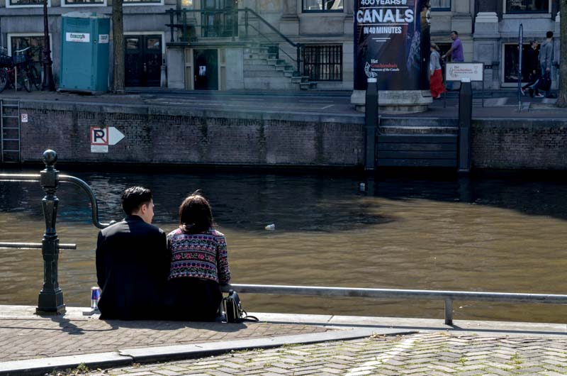 this one time, this couple sat by the canal