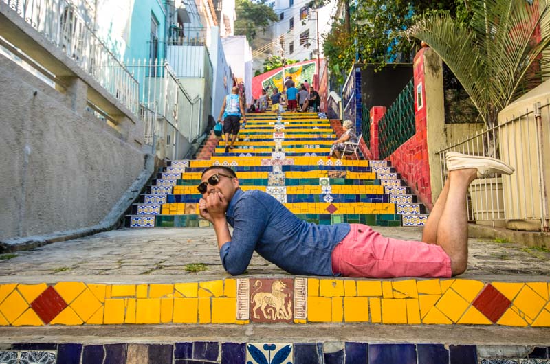 once, i saw a man striking a sexy pose on colourful steps